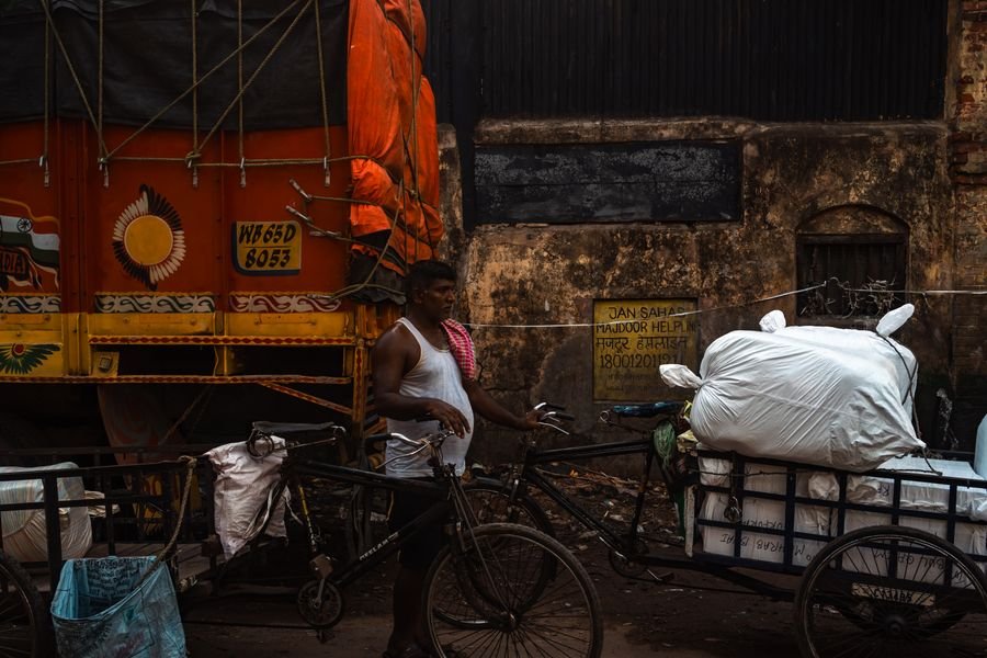 Man transporting cargo by bicycle in Kolkata
