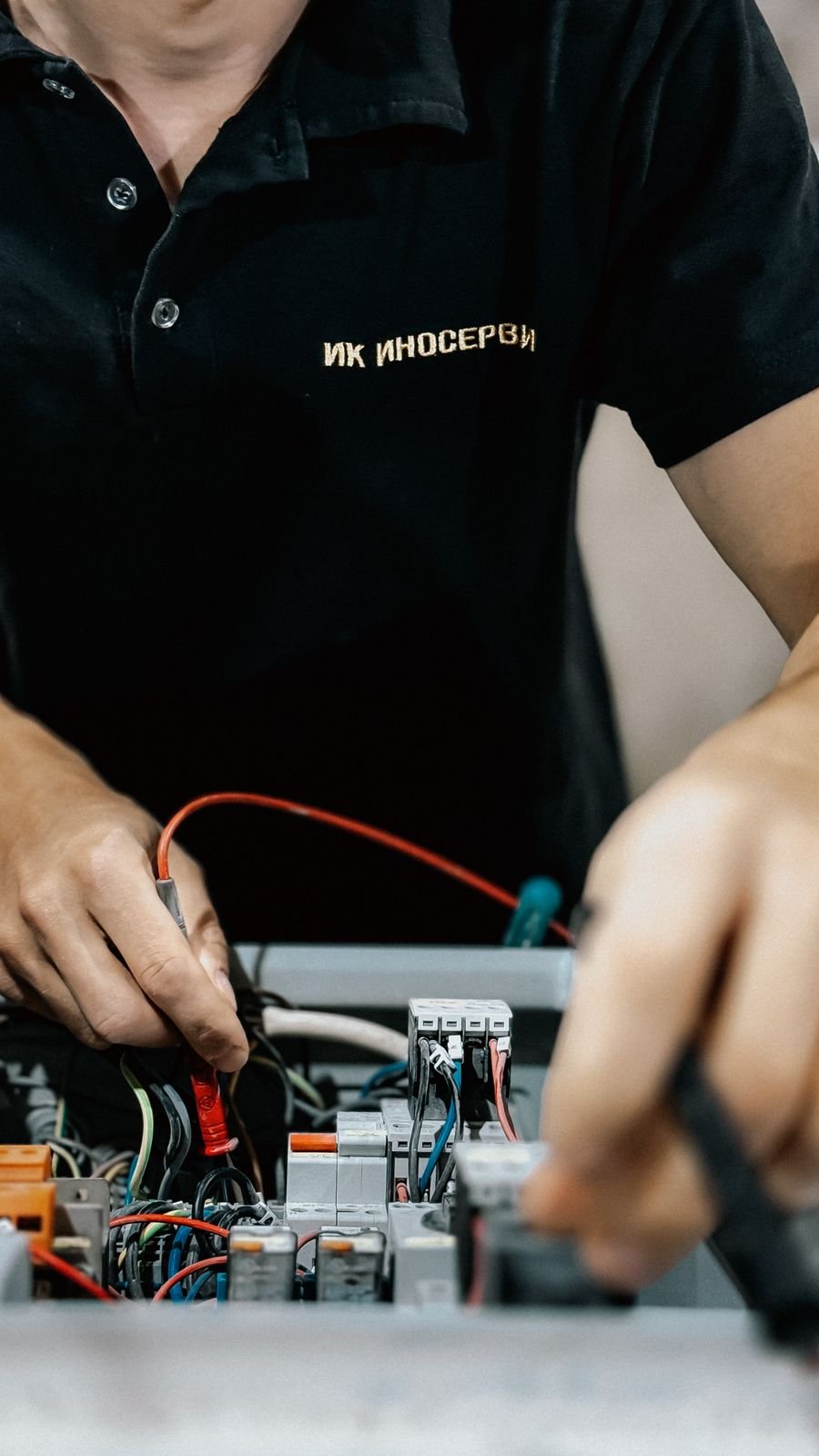 Electrician repairing an electrical circuit